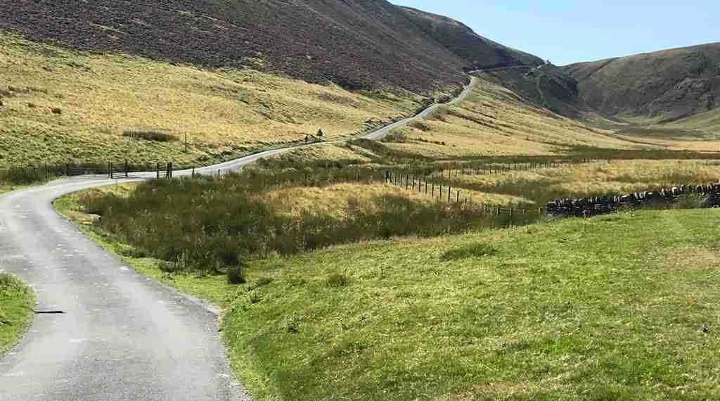 a road leading to a hill