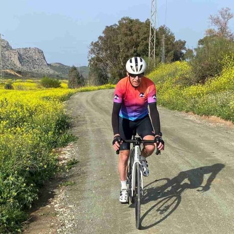 Male Cyclist Wearing Port Velo Cycling Tour Jersey